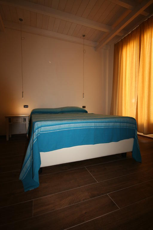 Villa La Conchiglia Rooms Кала-Ліберотто Номер фото